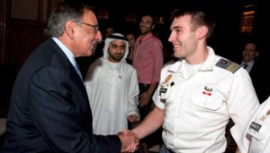 US Defense Secretary Panetta greets a West Point cadet in Abu Dhabi