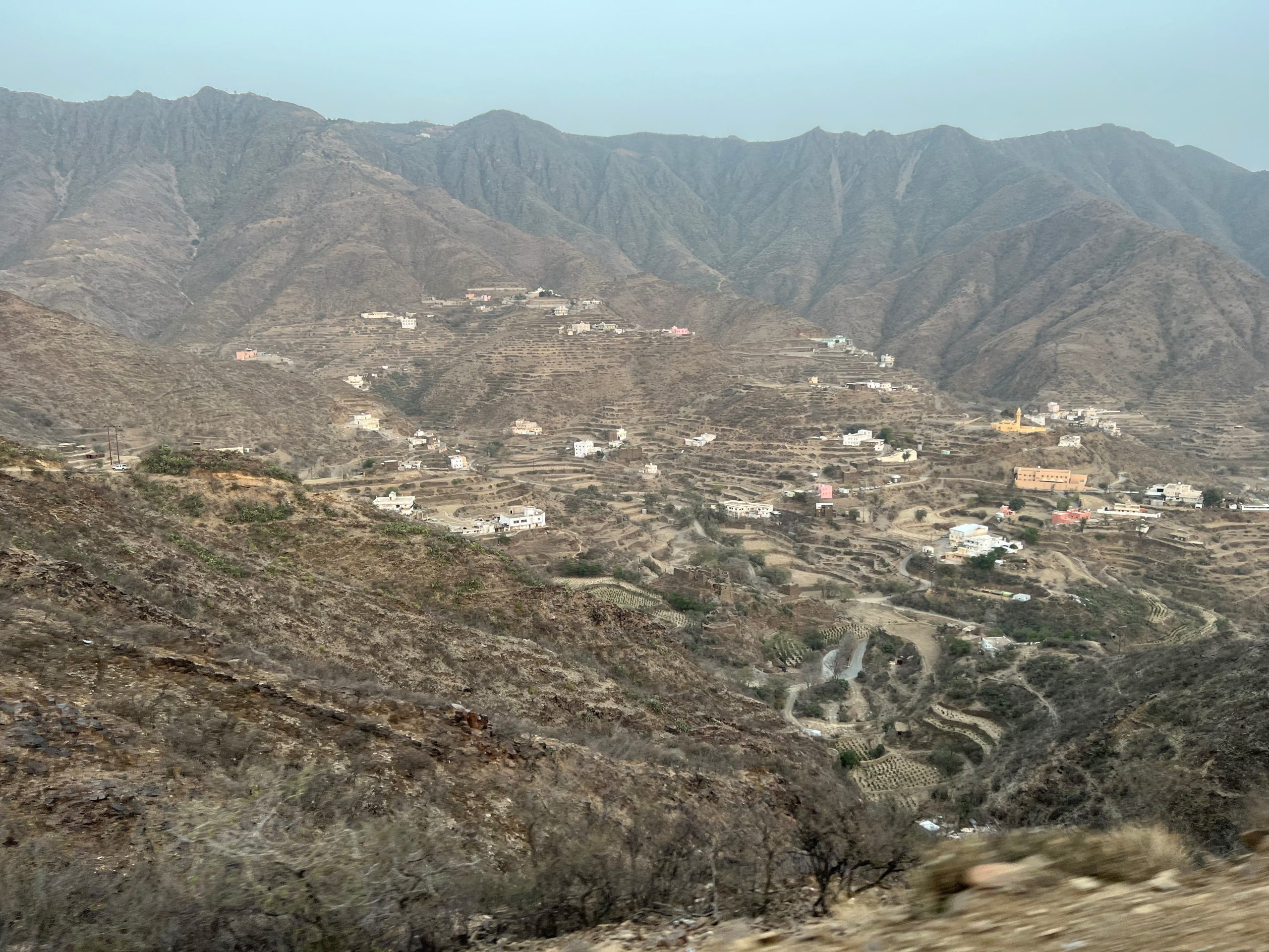 small sets of homes among a mountainous landscape