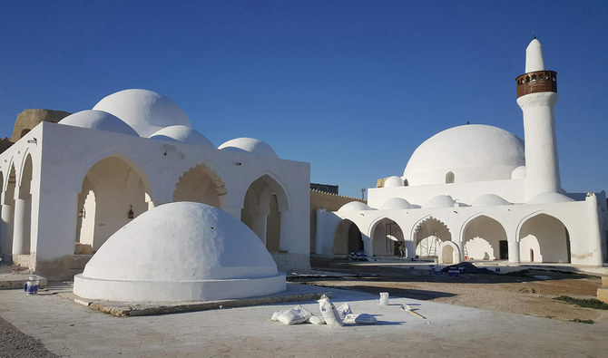 white stone buildings with domed roofs