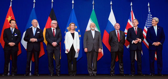 (From Left) Head of Mission of People's Republic of China to the European Union Hailong Wu, French Foreign Minister Laurent Fabius, German Foreign Minister Frank-Walter Steinmeier, European Union High Representative for Foreign Affairs and Security Policy Federica Mogherini, Iranian Foreign Minister Javad Zarifat, Russian Deputy Political Director Alexey Karpov, British Foreign Secretary Philip Hammond, and U.S. Secretary of State John Kerry following negotiations between the P5+1 member nations and Iranian officials about the future of Iran's nuclear program at the Ecole Polytechnique Federale de Lausanne in Switzerland on April 2, 2015. Photo: U.S. Department of State.