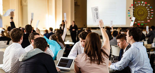 Students vote during the summit session at a Model Arab League in Denver, CO.