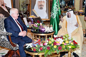 Iraqi President Fuad Ma`sum meets with Saudi Arabia's King Abdullah bin Abdul-Aziz Al-Saud in Riyadh in November 2014.