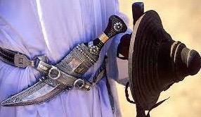 Men wear a khanjar and a buckler shield for formal dress.